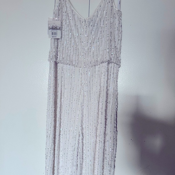 Size 14 Sequins White Jumpsuit Never been worn